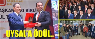 BAŞKAN UYSAL'A ÖDÜL..